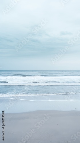 A Moody Monochromatic Background featuring a Vast, Empty Beach under a Gloomy Sky - Rough Sea Waves Crashing under the Dull Light - Beautiful Moody Wallpaper created with Generative AI Technology