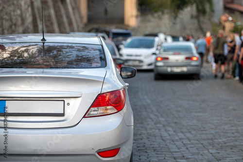 car in big traffic jam. Back view. Blurred background.