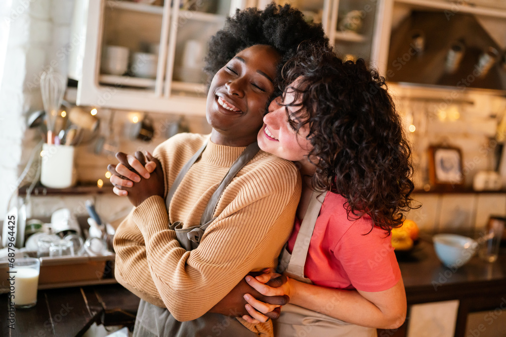 LGBT Lesbian couple love happiness concept. Homosexual women hugging and enjoying time together.