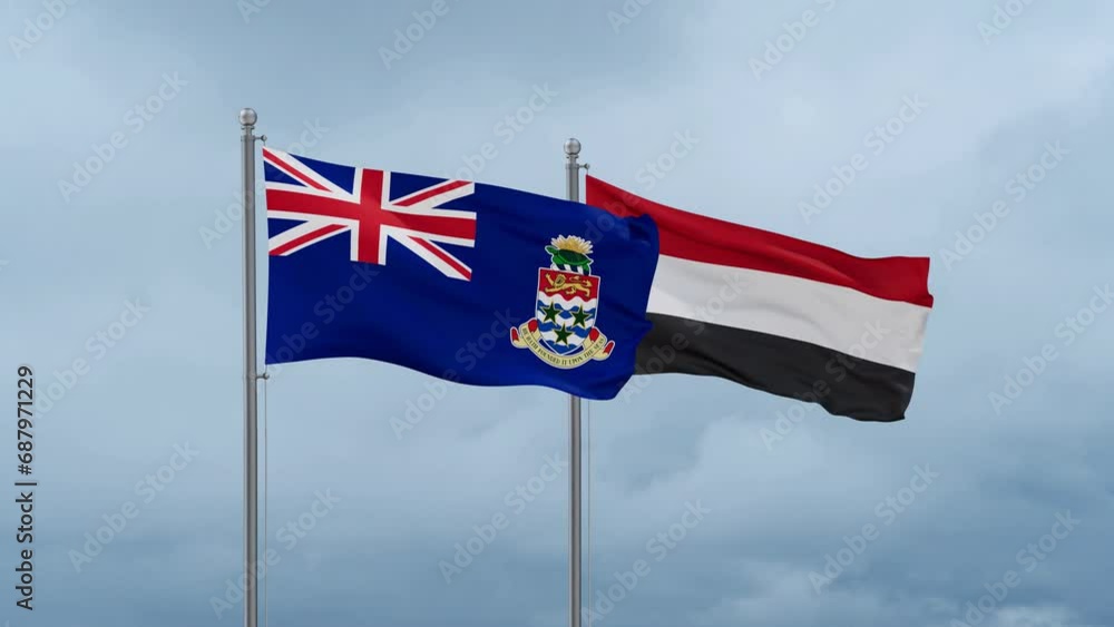 Yemen and Cayman Islands flag waving together on cloudy sky, endless seamless loop, two country cooperation concept Yemen and Cayman Islands flag waving together on cloudy sky, endless seamless loop, two country cooperation concept