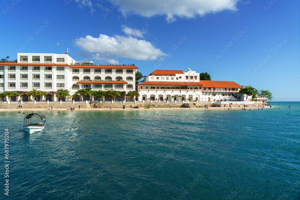 coastal view of the stone town seaboard showing  the beach and well preserved buildings 