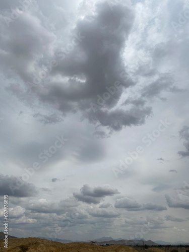 Canvas Print Blue and grey clouds in the overcast sky