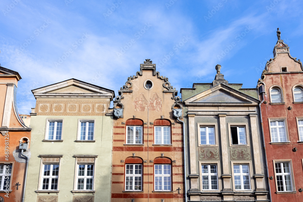 Old historical colorful building architecture facade of Old Town in Gdansk. Traveling Europe in summer. Vacation concept