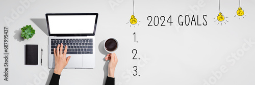 2024 goals with person using a laptop computer