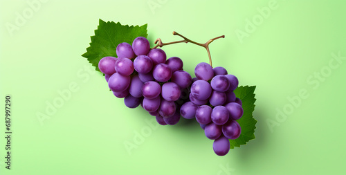 Wallpaper Mural fresh purple grape fruit healthy food concept Arrange a beautiful top view with space on a pastel green background. Torontodigital.ca