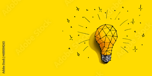 Idea light bulb with hand drawing sketch - Flat lay photo