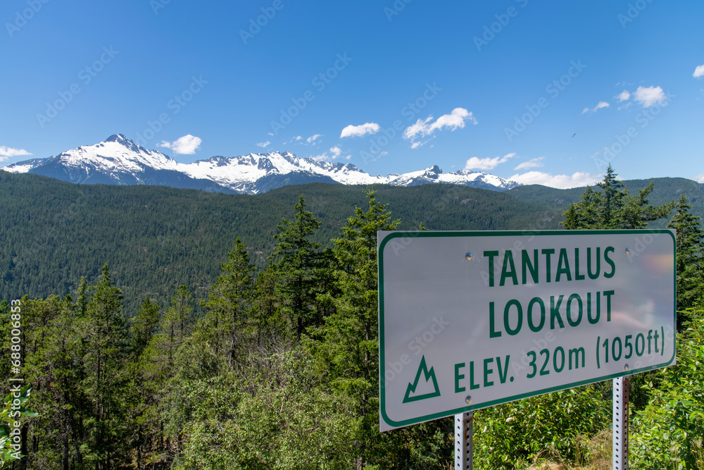 Panoramic view from the Tentalus Lookout point over the snow capped mountains of the Tantalus range along the Sea To Sky Highway 99 near Squamish, BC, Canada