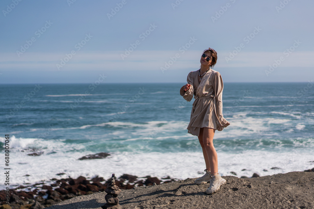 A girl walks on the ocean 