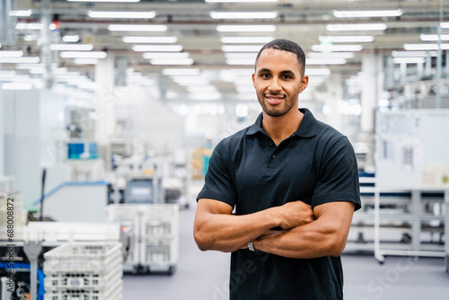 Portrait of a confident employee in a factory photo
