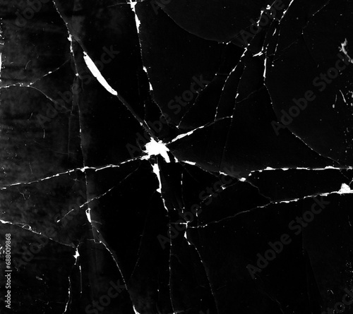 Grunge paper background. Cracked structure paper effect. Rough grunge pattern design. Texture of damaged and burned material. Texture overlay effect.