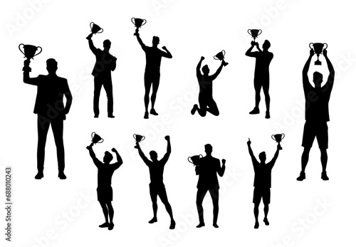 Sport winner holding a winning trophy, happy man with trophy cup silhouette
