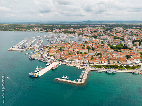 Croatia, Zadar County, Biograd na Moru, Aerial view of coastal town on Adriatic sea photo