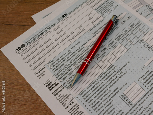 The pen is lies on the tax form 1040 U.S. Individual Income Tax Return. The time to pay taxes.