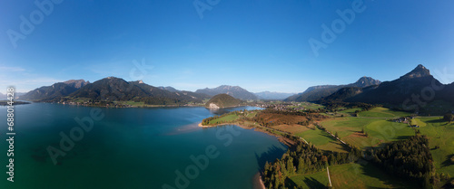 Austria, Salzburger Land, Strobl am Wolfgangsee, Drone view of lake Wolfgangsee and Blinklingmoos nature reserve photo