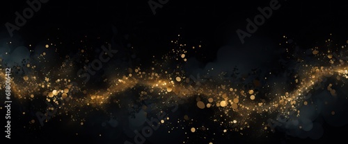 abstract black and gold background with gold flecks on