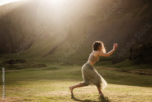 Girl dancing at sunset in Iceland © Rock and Wasp