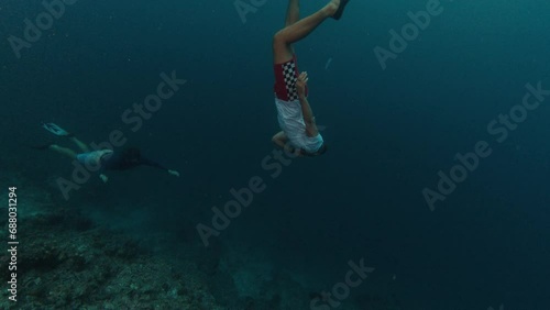 Wallpaper Mural Man swims underwater in the tropical sea Torontodigital.ca