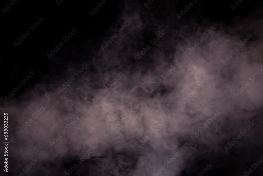 Fototapeta premium White steam on a black background.