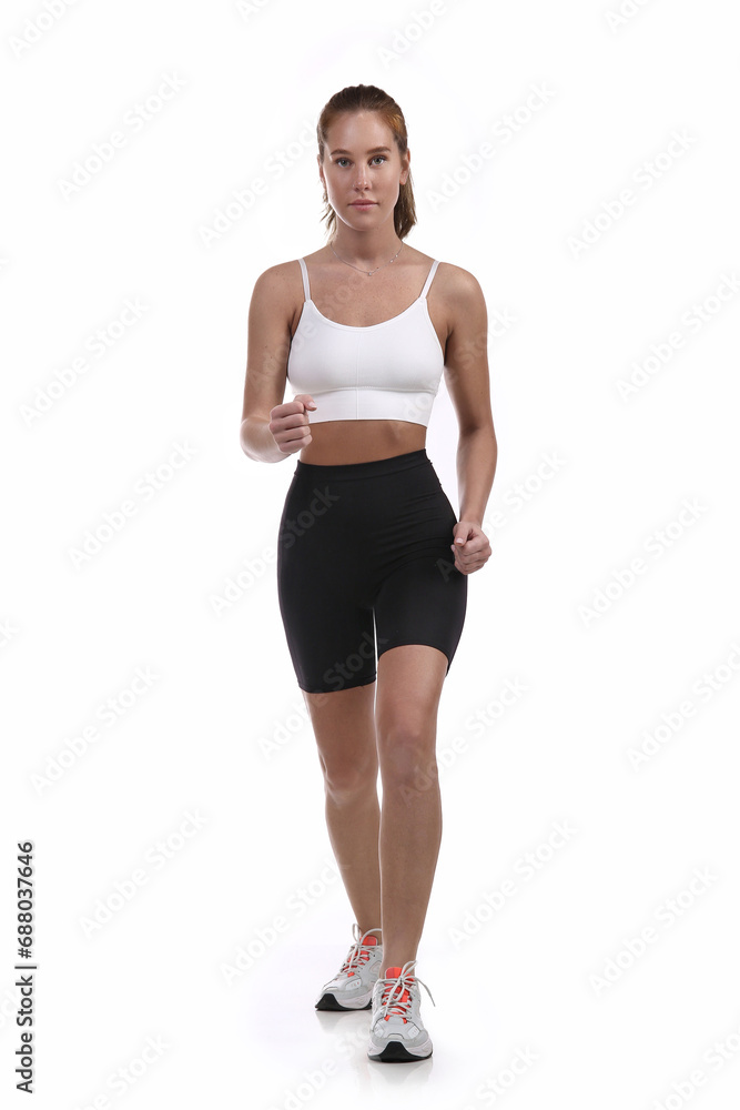 Fitness woman working out, studio shot. Fitness woman working out, studio shot.