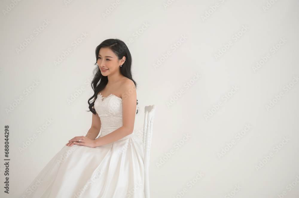 Portrait of beautiful bride with makeup and hairstyle in elegant wedding dress, wedding ceremony Portrait of beautiful bride with makeup and hairstyle in elegant wedding dress, wedding ceremony