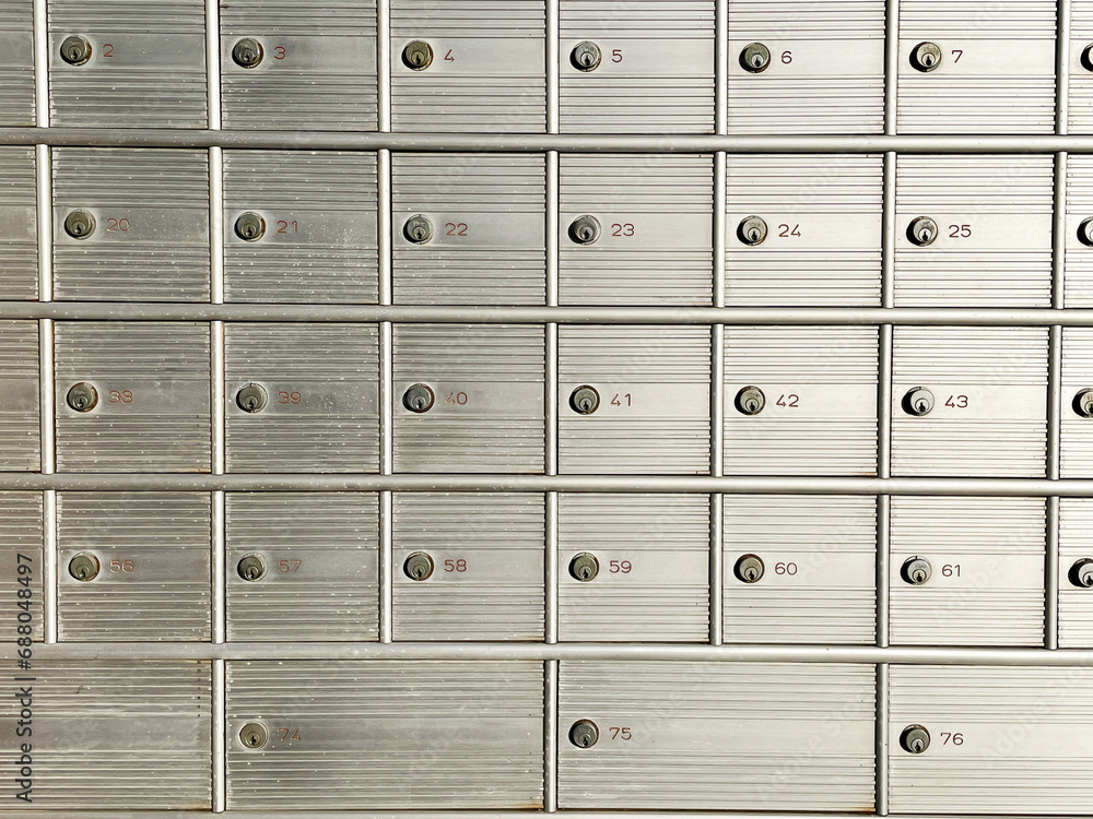 numbered safes in a post office located across the street numbered safes in a post office located across the street