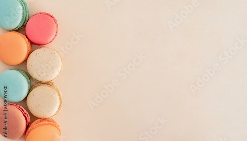 colorful french macaroons dessert on pastel background 