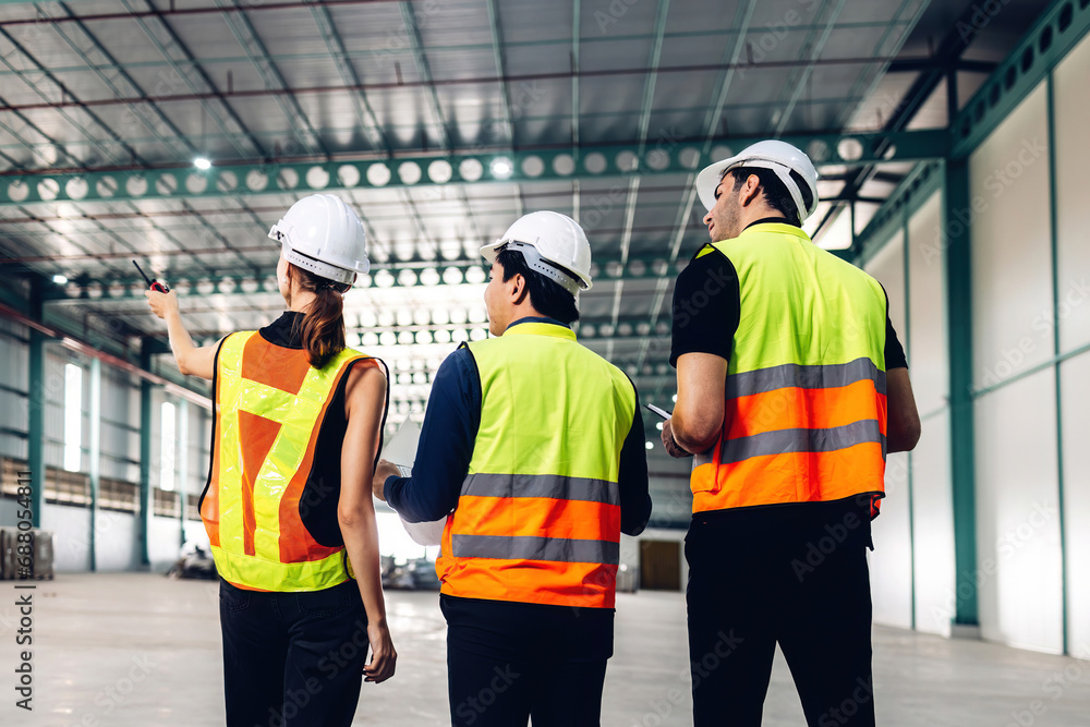Warehouse worker working in warehouse storage. Foreman or worker work at factory site check up products in site. Inventory worker working in factory Storehouse Warehouse worker working in warehouse storage. Foreman or worker work at factory site check up products in site. Inventory worker working in factory Storehouse