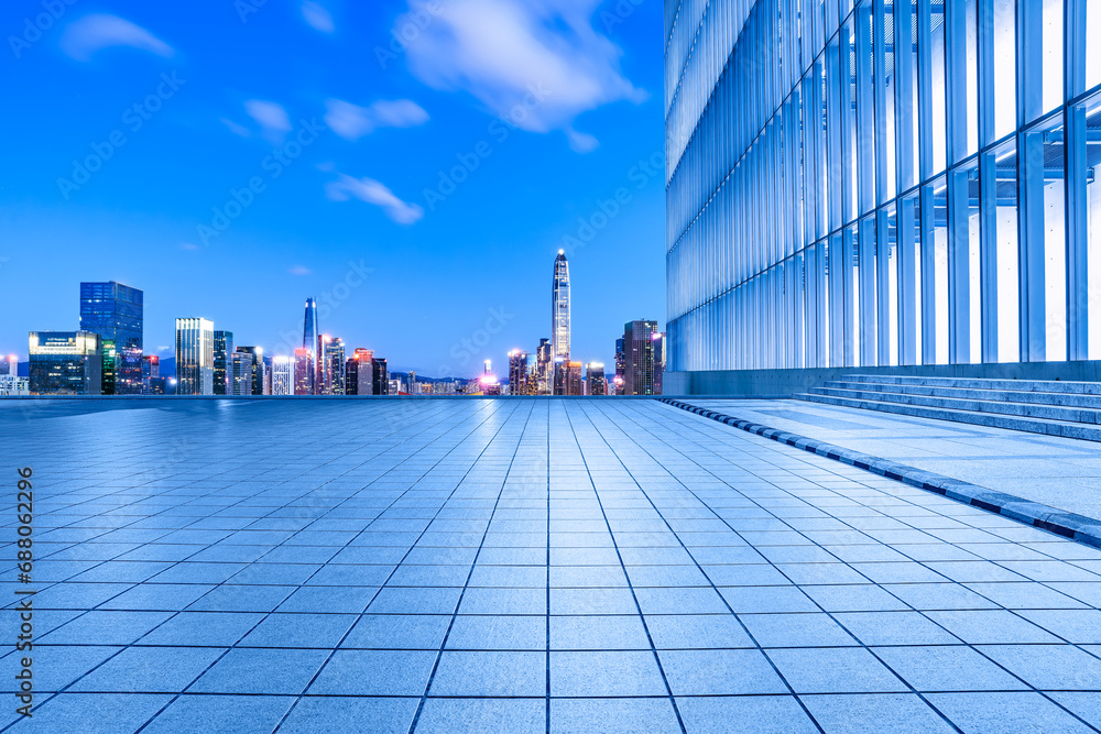 City square and skyline with modern buildings in Shenzhen at night, Guangdong Province, China. City square and skyline with modern buildings in Shenzhen at night, Guangdong Province, China.