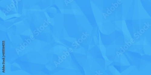 Sheet of crumpled blue paper as background, top view. Sheet of color crumpled paper as background. Space for design 