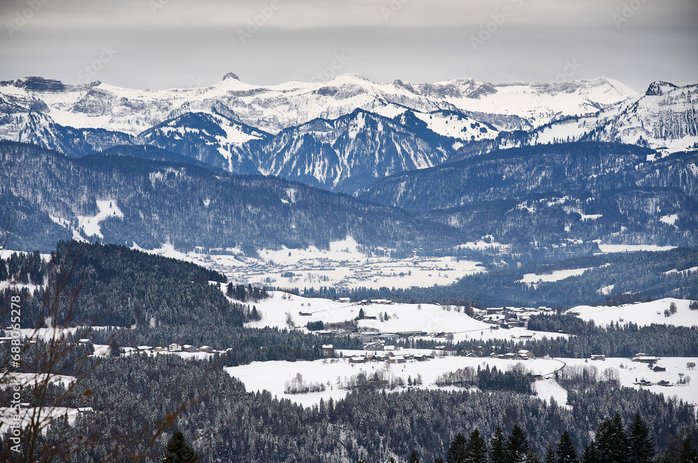panoramic view over the Bregenz Forest mountains in winter, Vorarlberg, Austria
