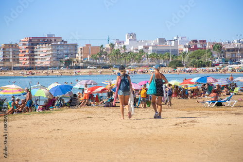 Vega Baja del Segura - Escenas de verano en playas de Torrevieja photo