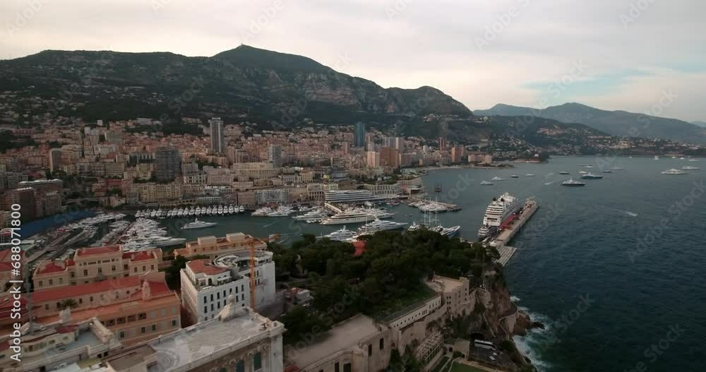 Aerial Forward Shot Of Famous Marine Science Museum In City On Cliff By Harbor - Monte Carlo, Monaco Aerial Forward Shot Of Famous Marine Science Museum In City On Cliff By Harbor - Monte Carlo, Monaco