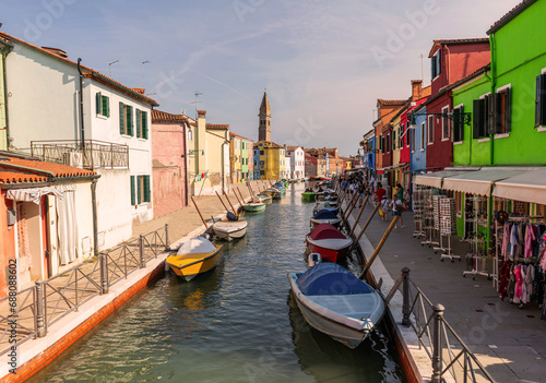 Burano island colorful houses place with canal and typical boats in Venice Italy © Blogtrip