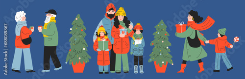 Christmas. People with Christmas presents and hot drink. Family celebrating Christmas. Children, seniors, mother, father, grandmother and grandfather outdoors in the evening.