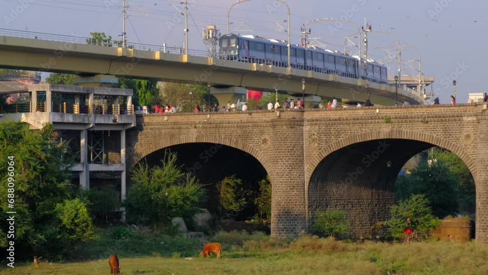 30 November 2023, Pune Metro Near Chhatrapati Shivaji bridge Built in 1924, this Heritage bridge built during the British rule by Raobahadur Ganpatrao Mahadeo Kenjale, Pune, Maharashtra, India. 30 November 2023, Pune Metro Near Chhatrapati Shivaji bridge Built in 1924, this Heritage bridge built during the British rule by Raobahadur Ganpatrao Mahadeo Kenjale, Pune, Maharashtra, India.