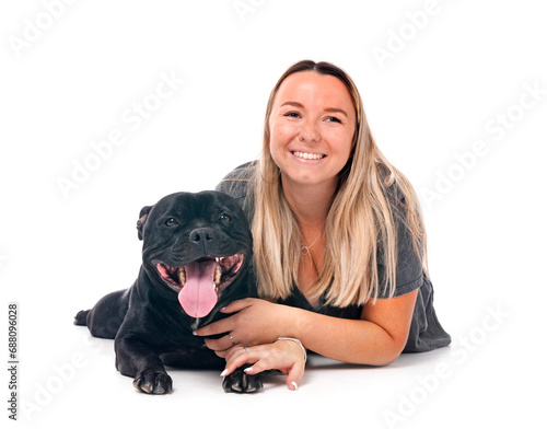 staffordshire bull terrier and woman
