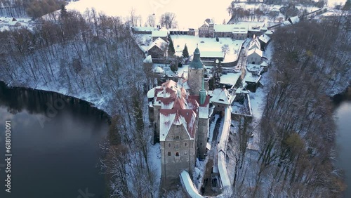 Aerial view of the beautiful Czocha Castle, located in Sucha in Lower Silesia, Poland. The shots were recorded in winter.