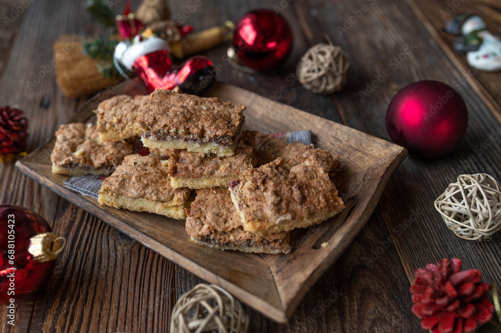 Fototapeta premium Christmas nut pastry from austria with soft hazelnut topping and shortbread cookie base 