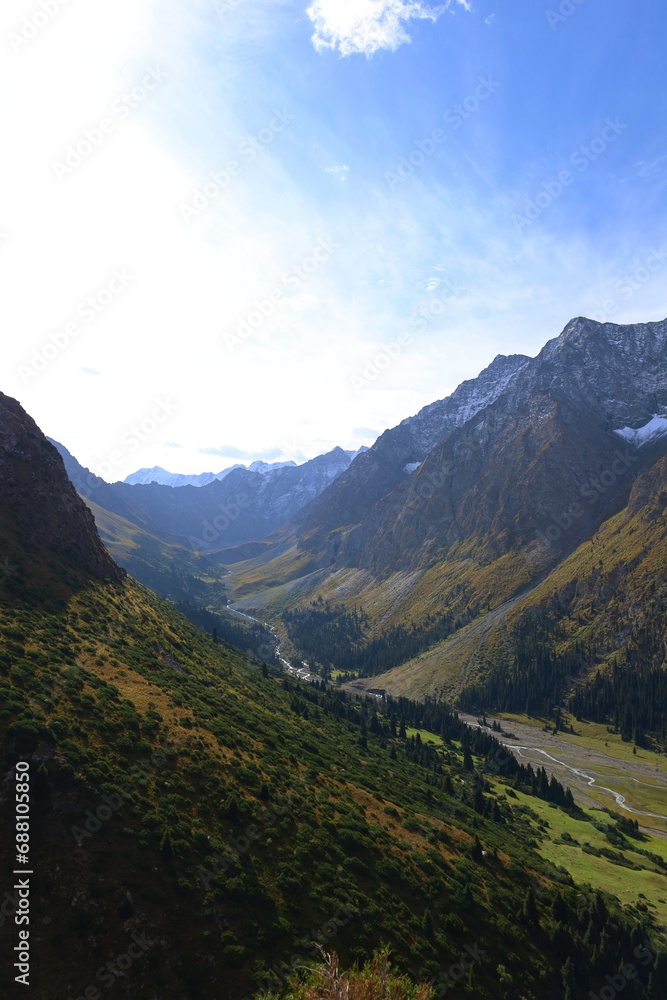 Last part of Ak-Suu Traverse trek crossing Archa-Tor mountain pass from Jeti-Oguz to Kyzyl-Suu in Karakol national park, Kyrgyzstan