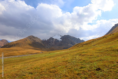 Landscape of Tian Shan Mountains next to Kol Ukok lake in Naryn region, Kyrgyzstan