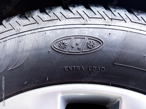 Tire sidewall all weather and extra load information © Milan