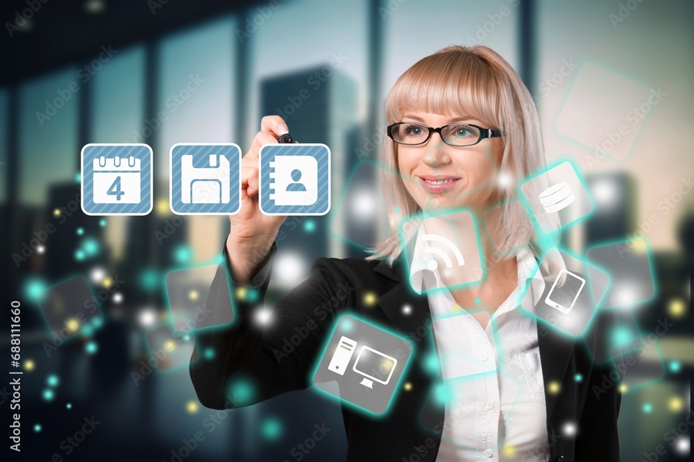 Young smart woman working with futuristic graphic Young smart woman working with futuristic graphic