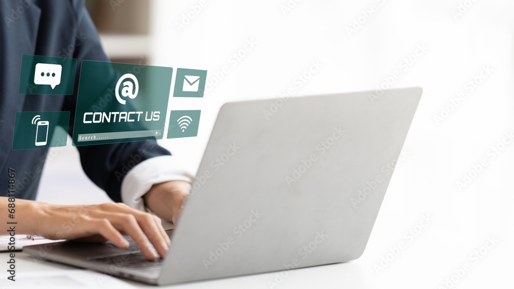 Person using laptop on screen contact us, email, address, operator, customer, phone services agen, customer support hotline.contact us concept Person using laptop on screen contact us, email, address, operator, customer, phone services agen, customer support hotline.contact us concept