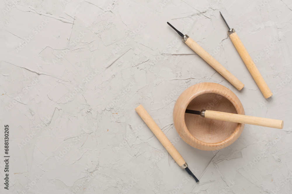 Carpenter tools with wooden objects on concrete background ,top view Carpenter tools with wooden objects on concrete background ,top view