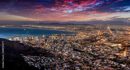 aerial view night Cape town, waterfront and the ocean, city lights are on