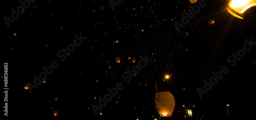 christmas, thousands of Chinese lanterns in the night sky of Pamplona Spain. lantern close-up © PhotoSoria 