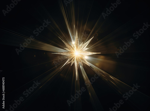 Star flare with yellow rays and beams on dark background