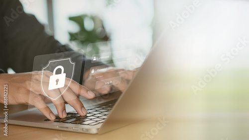 The concept of cyber security and online password login. hands typing and entering a social media username and password, log in online bank account or personal information, hacker for data protection