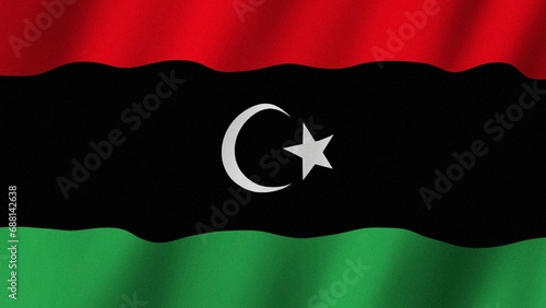 Libya flag waving in the wind. Flag of Libya images photo