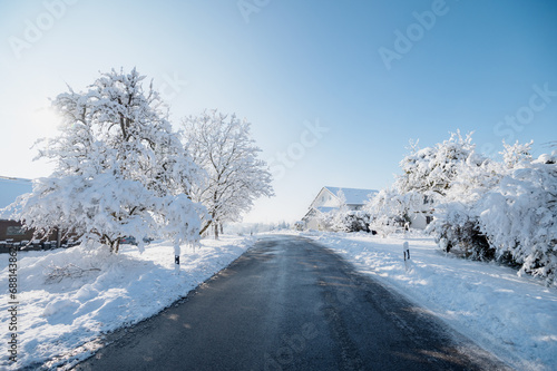 Snowy winter street in the village